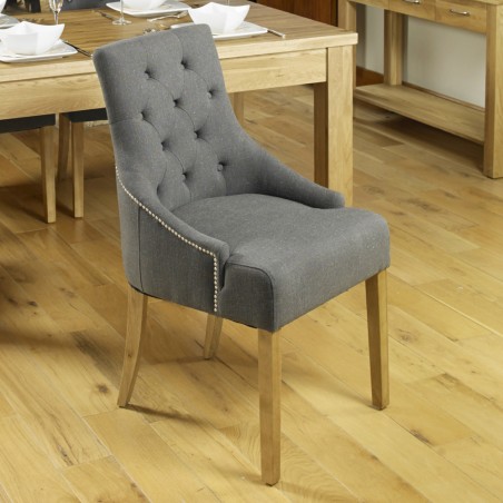Teramo Slate Grey Accent Upholstered Oak Dining Chair front mood shot