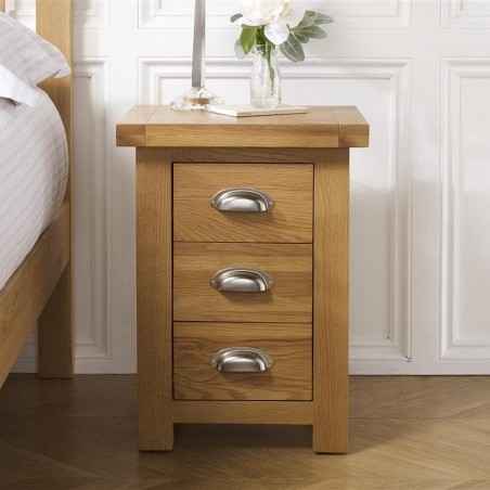Coleby Small 3 Drawer Bedside, mood shot front view